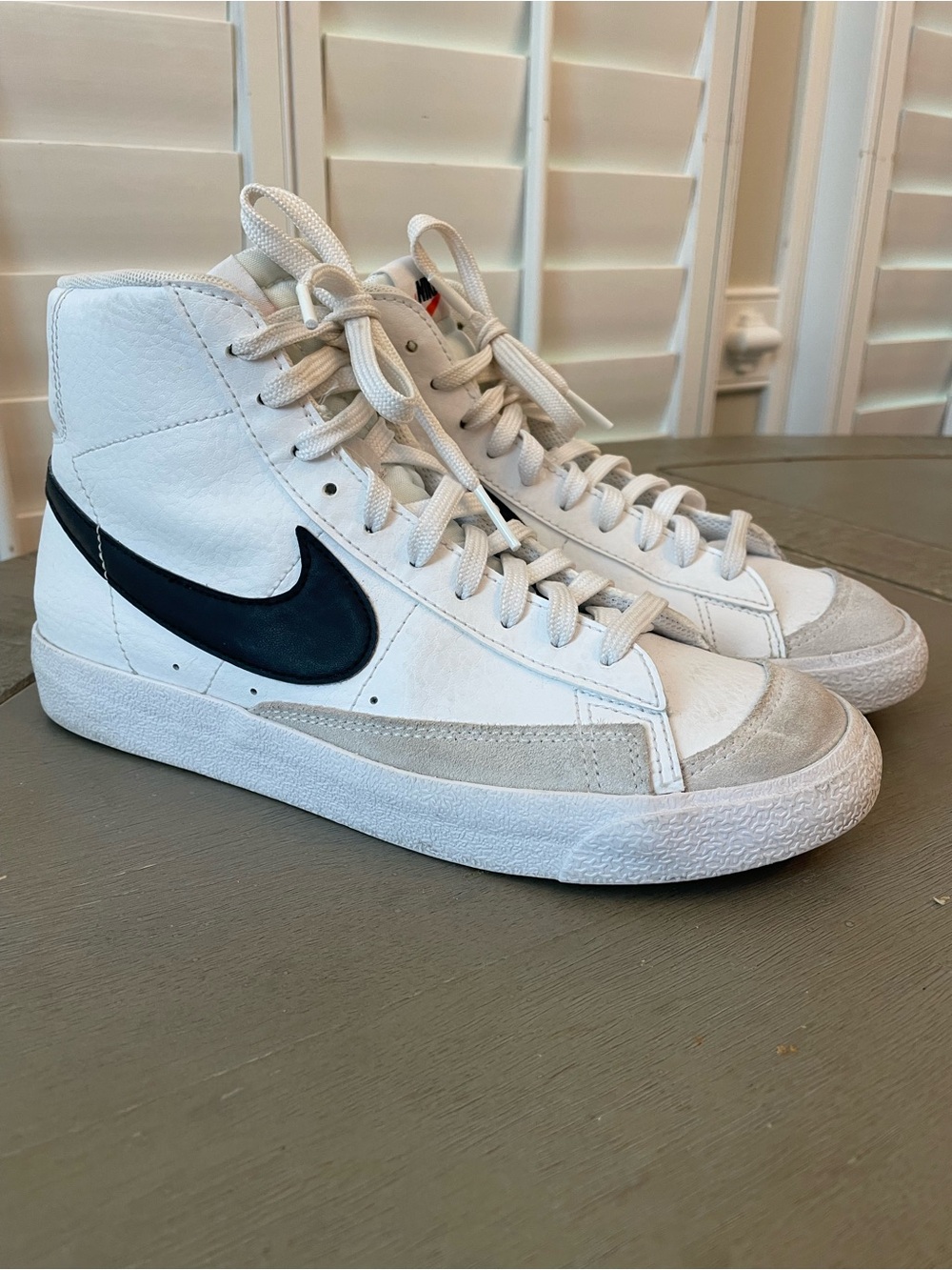 Nike Youth White High-Top Sneakers with Black Swoosh